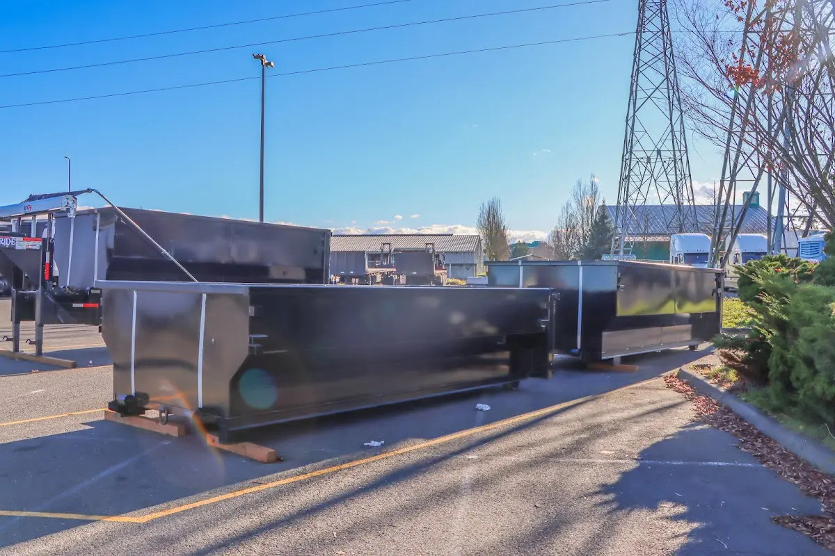 Roll-off dumpster ready for waste disposal at job site for Construction Dumpster Rental in Dickinson